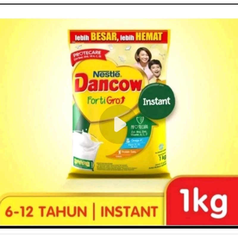 

Susu Bubuk Dancow Fortigro 1 Kg Usia 6-12 Tahun 1Kg Susu Instant Instan Coklat Putih Cokelat