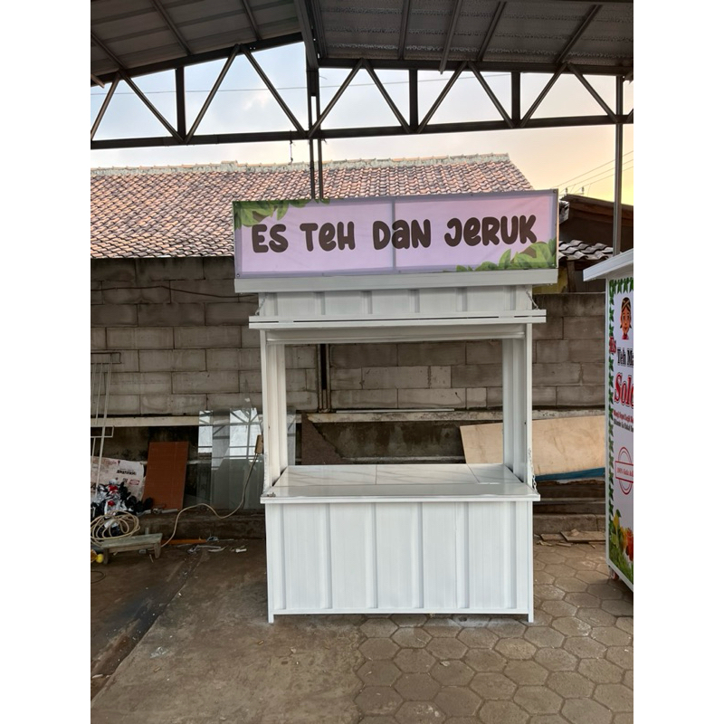 booth es jeruk peras ukuran