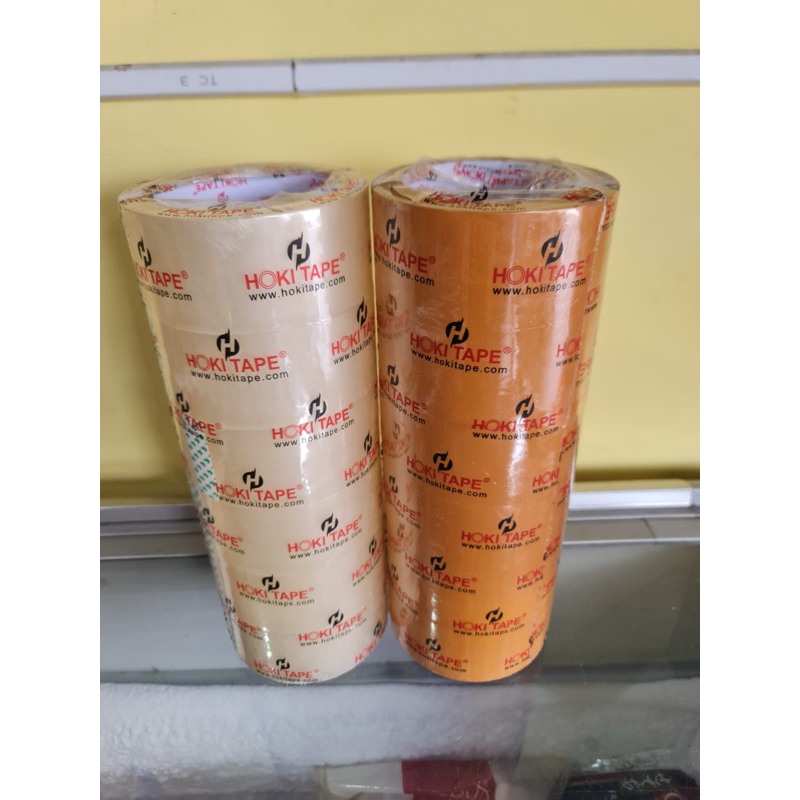 

lakban bening dan coklat. di note ya kak