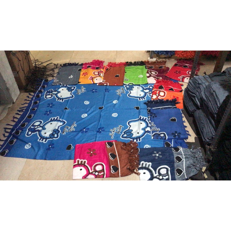 kain pantai bali rumbai motif hello kitty