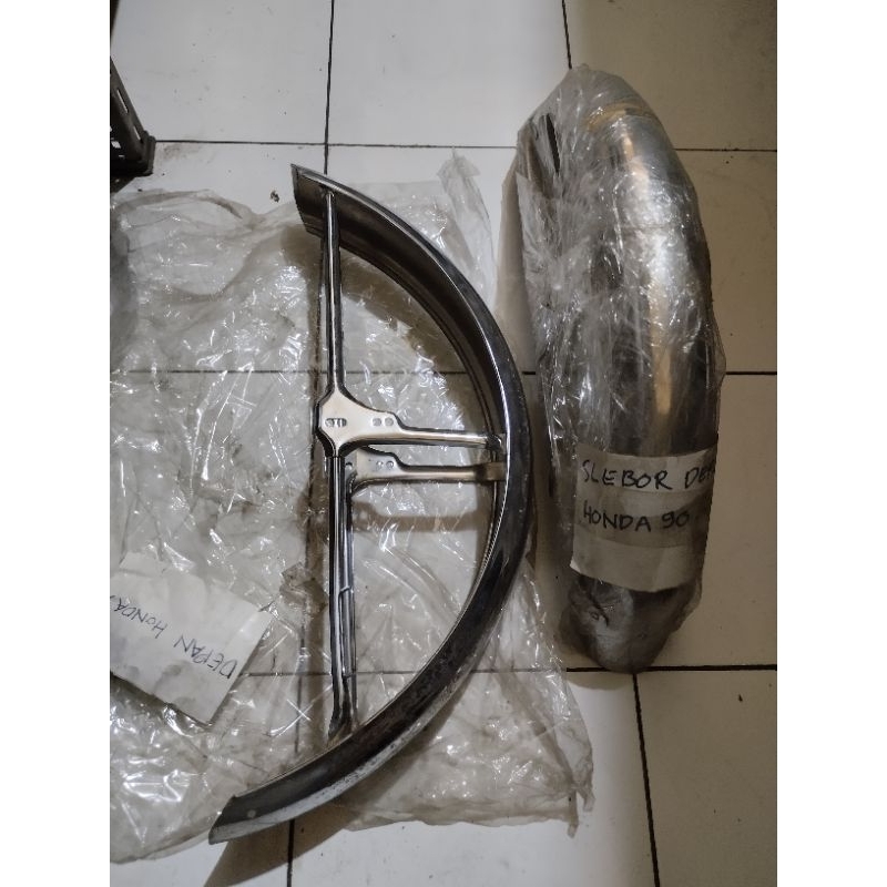 spakbor selebor depan Suzuki a100 urami