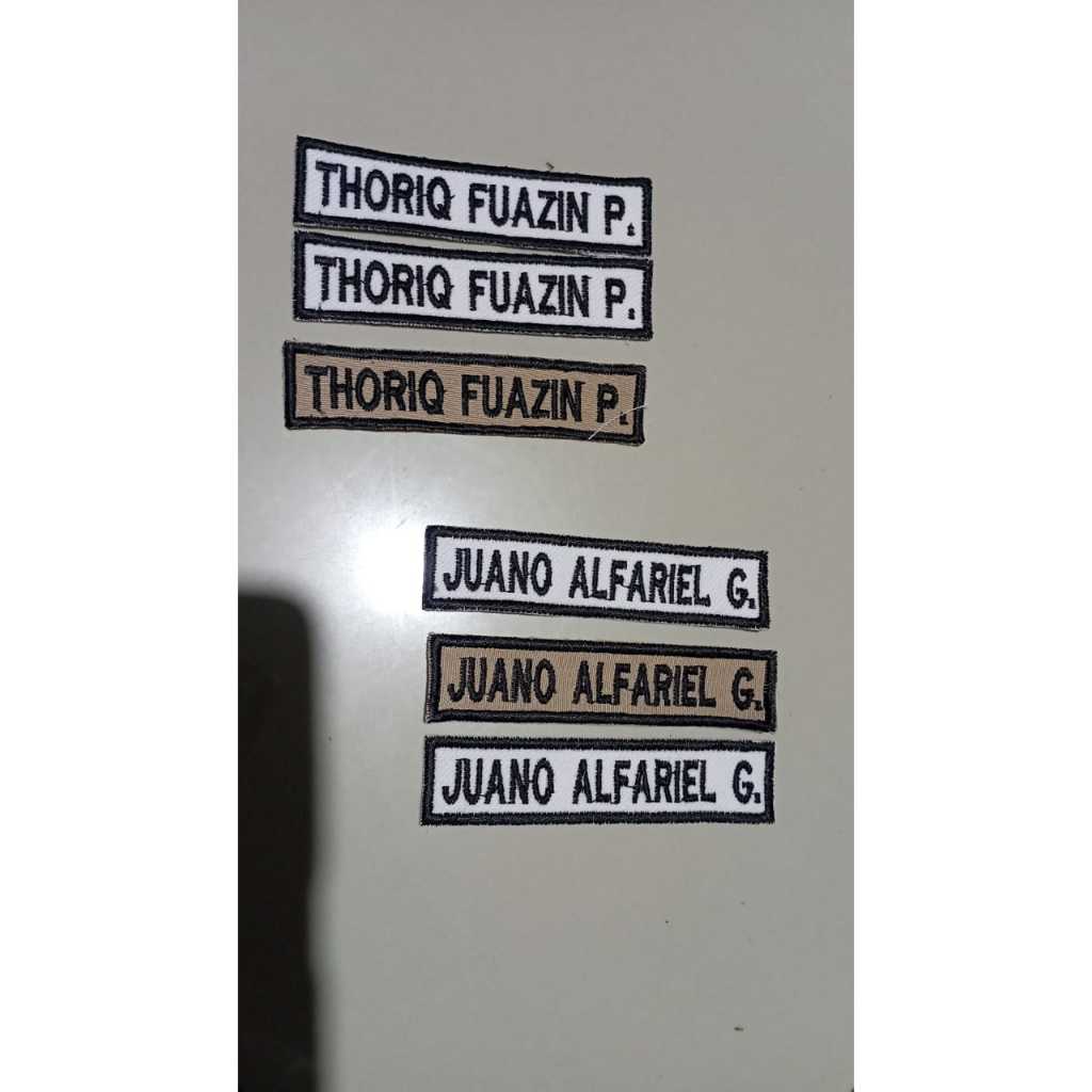 

Bordir nama/name tag