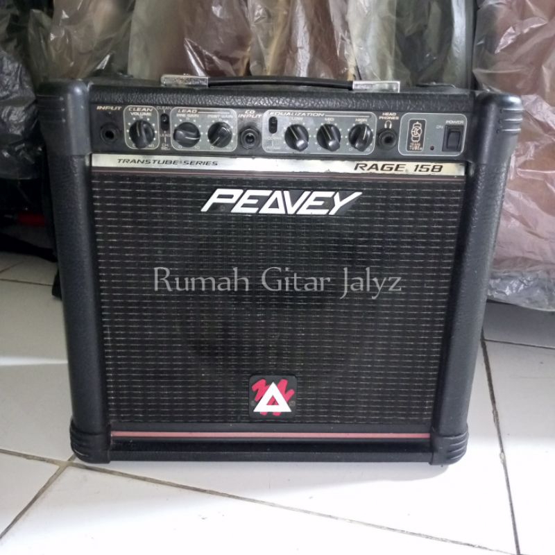 ampli gitar PEAVEY RAGE 158 TRANSTUBE ORI logo segitiga