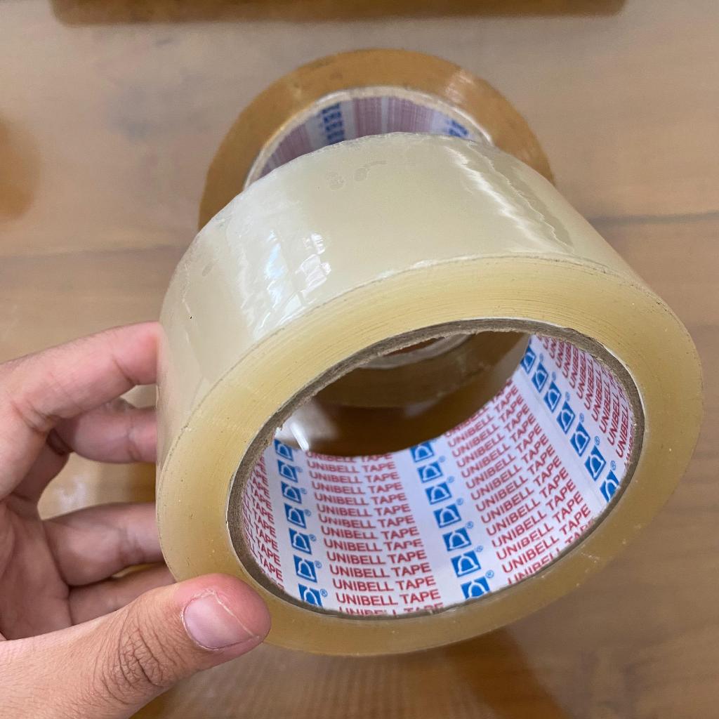 

UNIBELL Lakban Isolasi Solasi Bening / Cokelat OPP 2 inch (48mmx85yd) / OPP Tape panjang 85 yard murah berkualitas