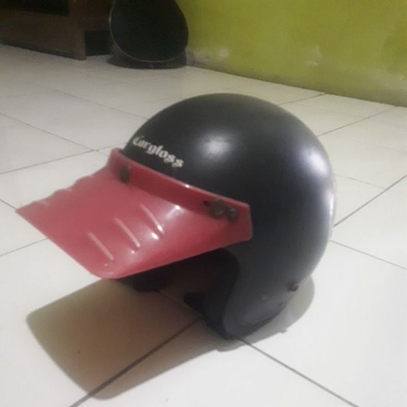 helm bekas bentuk bogo