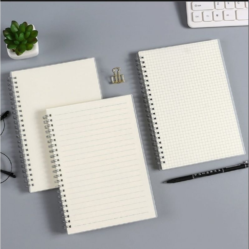 

80 halaman Notebook A5 spiral. Lined atau grid