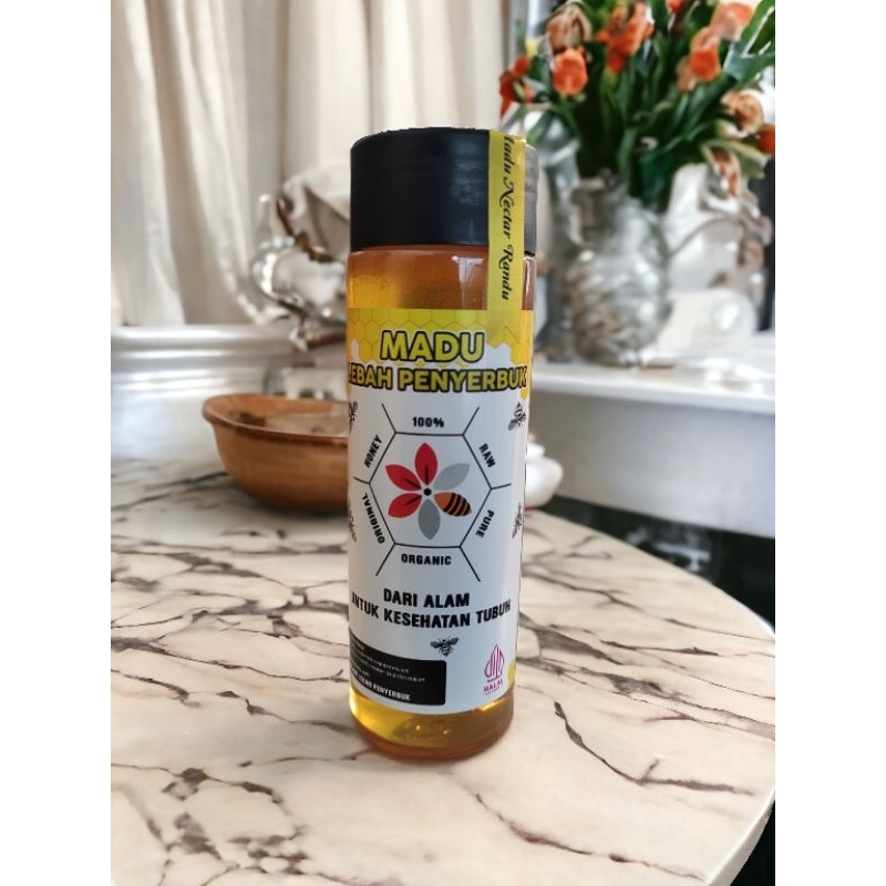 

Madu asli nektar bunga randu 100% murni dari alam