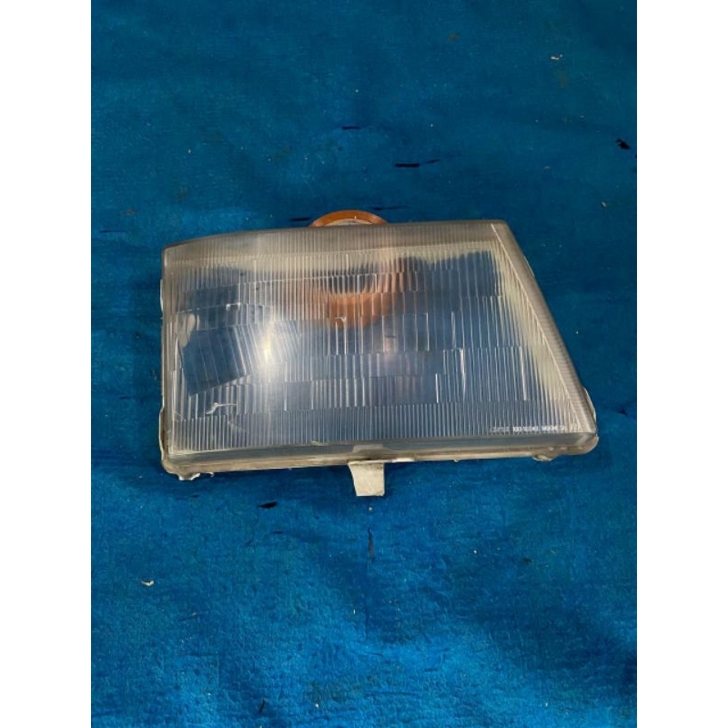 Kaca lampu depan Mitsubishi canter ps110 125 136 original
