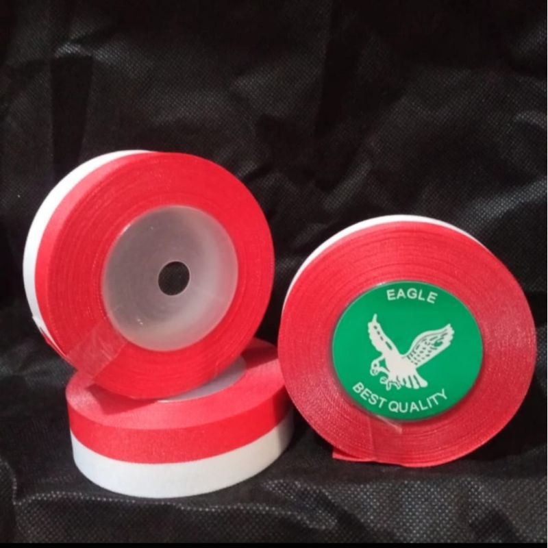 

Pita Merah Putih 2.5 cm per roll 25 yard / Pita Merah Putih 1 inchi per roll / Pita Bendera Merah Putih