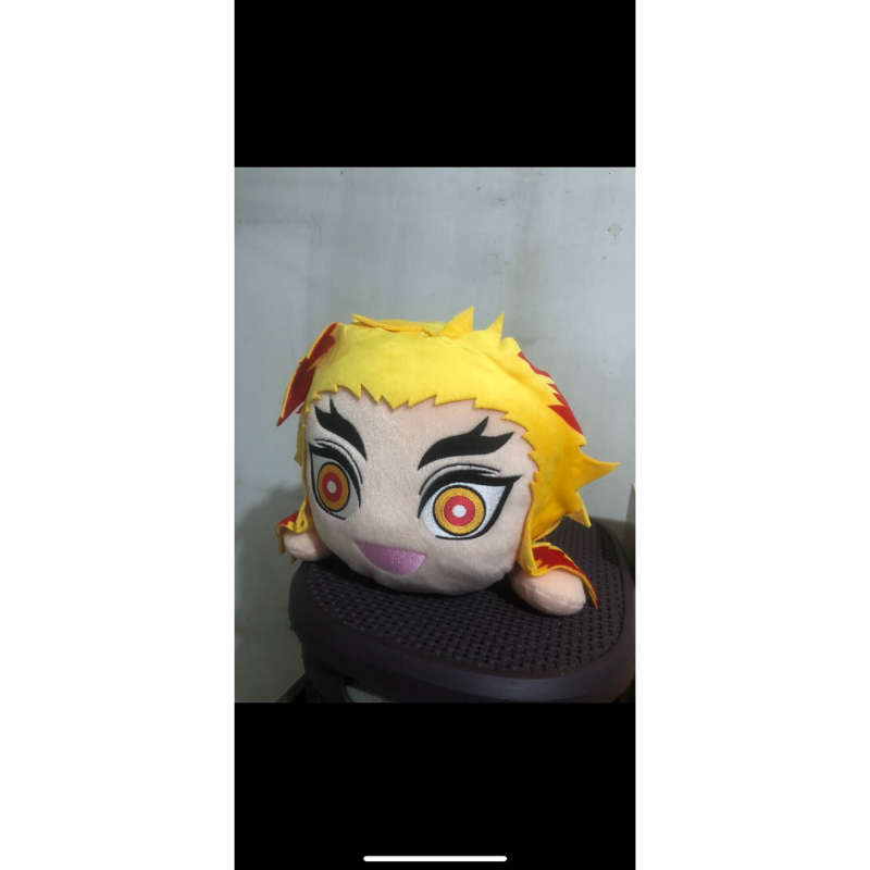 boneka zenitsu agatsuma rebahan