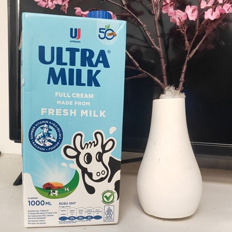 

kotak susu bekas 1 liter .