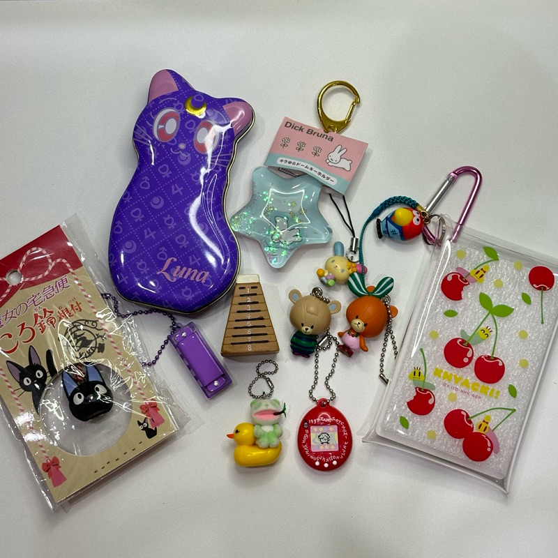 various gacha gotochi trinkets tamagotchi kyoro miffy pouch with caribiner luna sailormoon tincase u