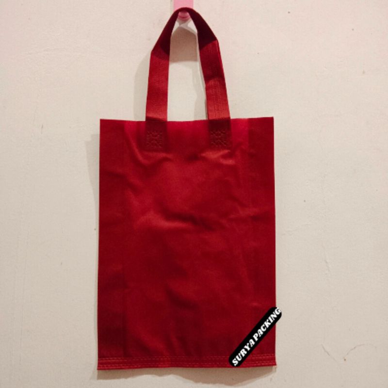 

(pAKeT 60pcs)Goodiebag lipat samping 25x35 kain spunbond