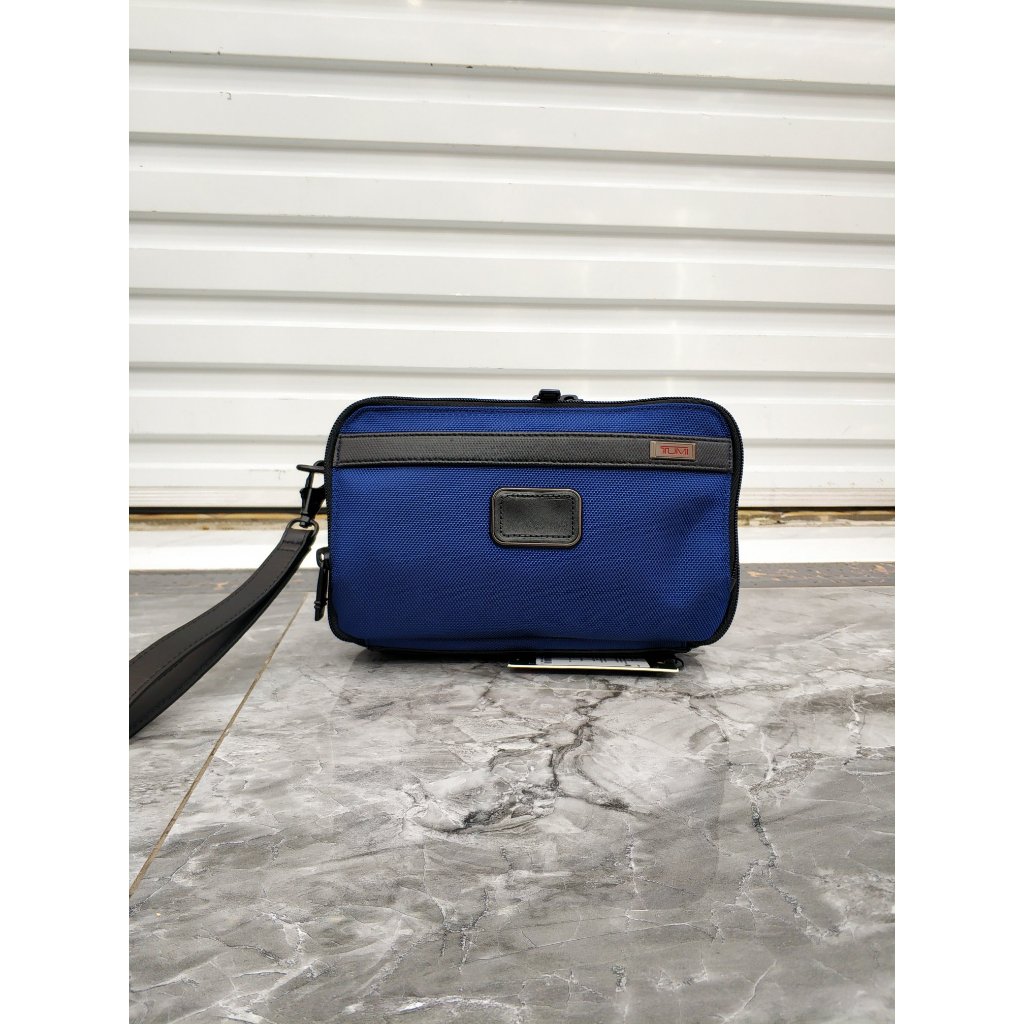 Tumi clutch bag - tas tumi