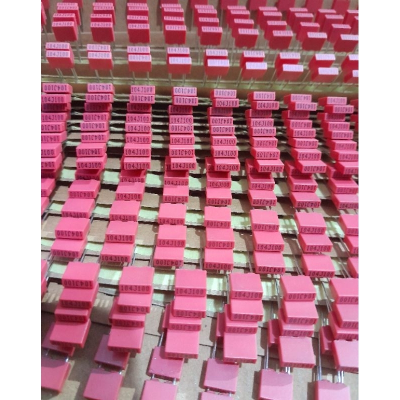 CAPASITOR MKM 104J100V CAPASITOR MKM 104 MERAH RENCENG 10PCS