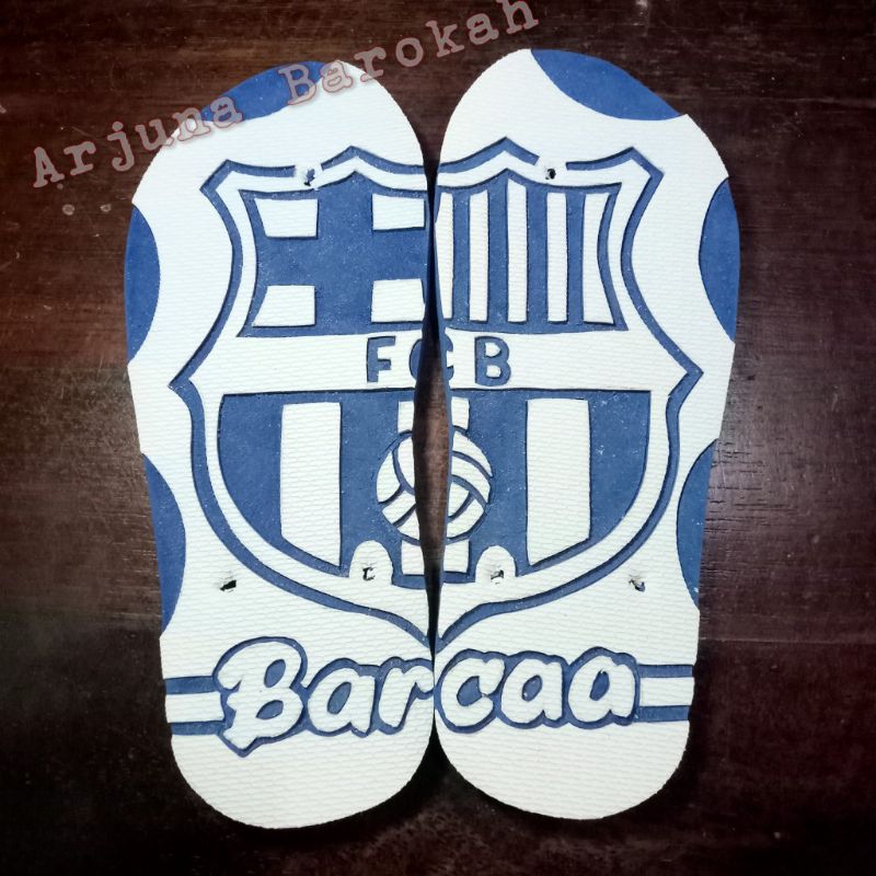 Sandal swallow ukir gambar sendal jepit swallow