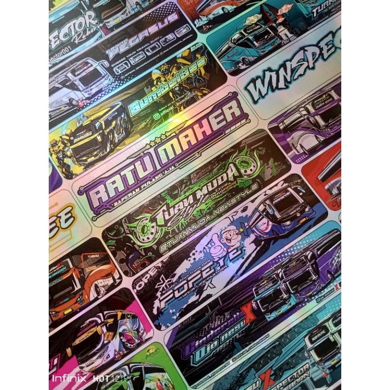 

Mainan stiker hologram bismania Basuri seri baru isi 12pcs belakangnya putih