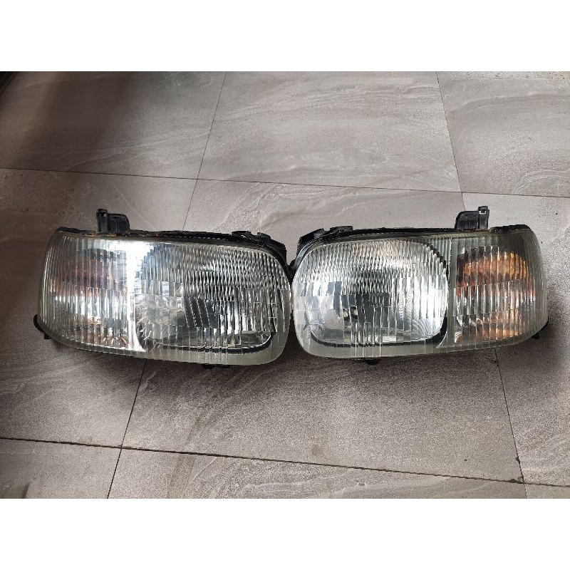 headlamp Ford escape 4x4 2003