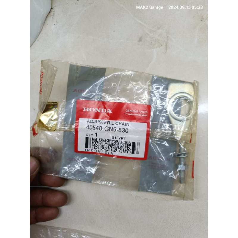 setelan stelan rantai Adjuster L chain Honda Astrea grand legenda original AHM 40540 GN5 830