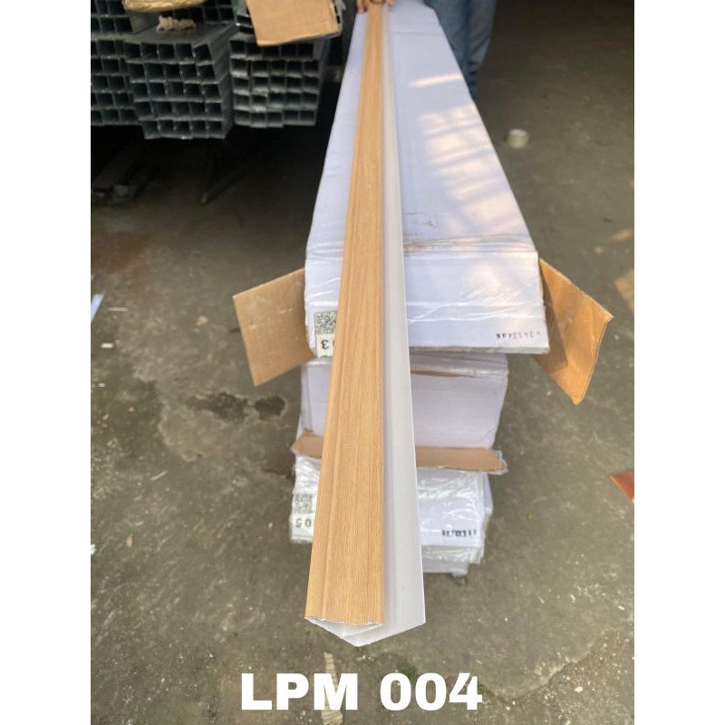 List profil tembol pvc motif serat kayu