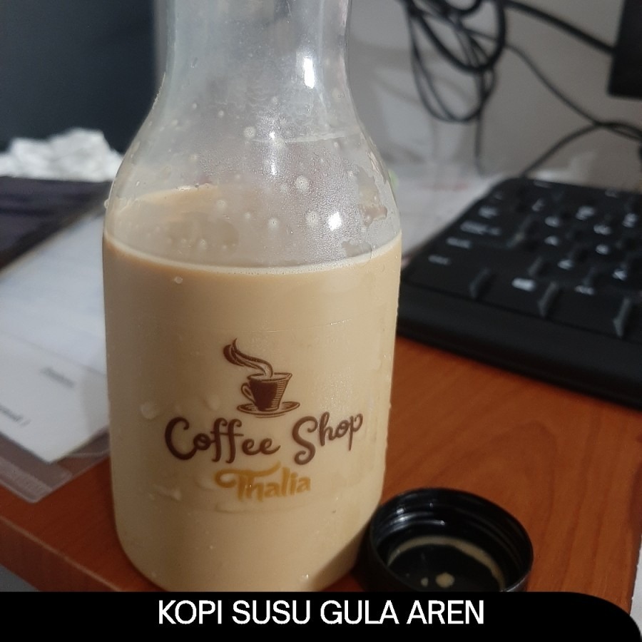 

THALIA COFFEE 200ML BOTOL PET. MINUMAN KOPI SUSU GULA AREN HOME MADE. FRESH DAN GAK BIKIN MUAL DILAMBUNG, DINGIN LEBIH ENAK.