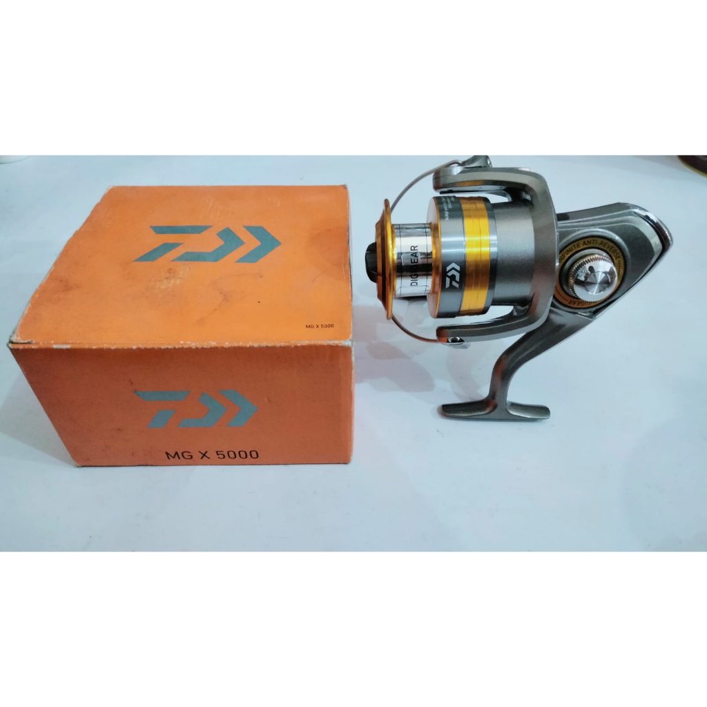 Reel Daiwa MG X