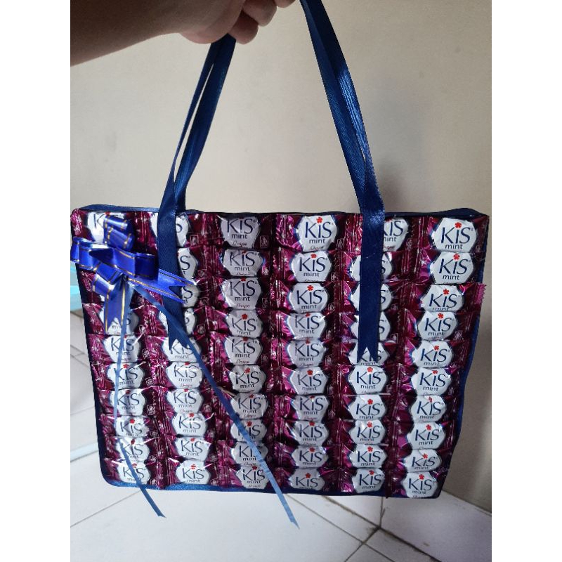

Buket Tas Permen/Buket snack/hari ibu/hari guru/kado ulang tahun/wisuda dll