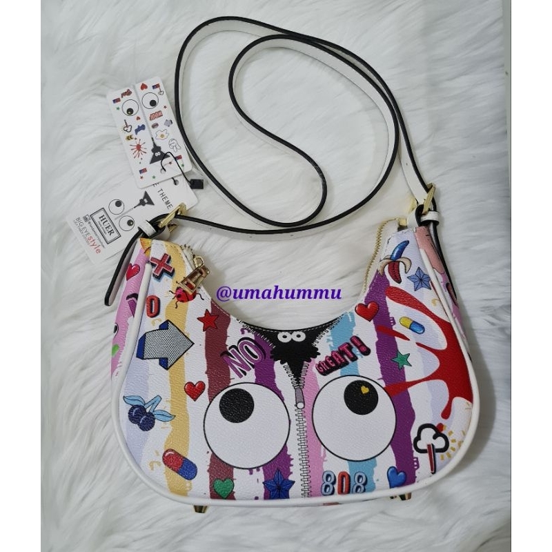 preloved tas huer edvhy eye theme printed hobo bag white