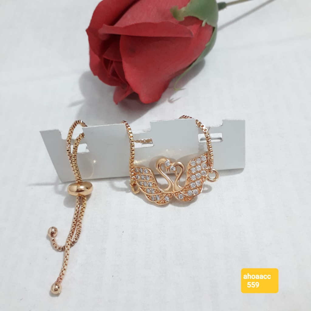 Gelang permata serut sepasang angsa warna emas dewasa.
