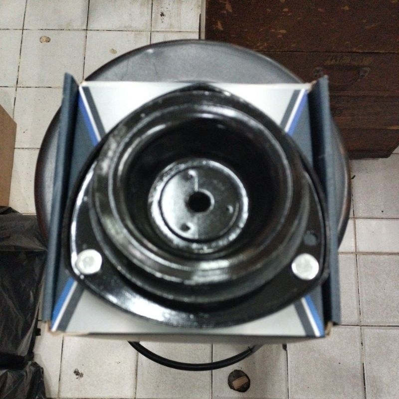 Support shock depan Baleno Aerio