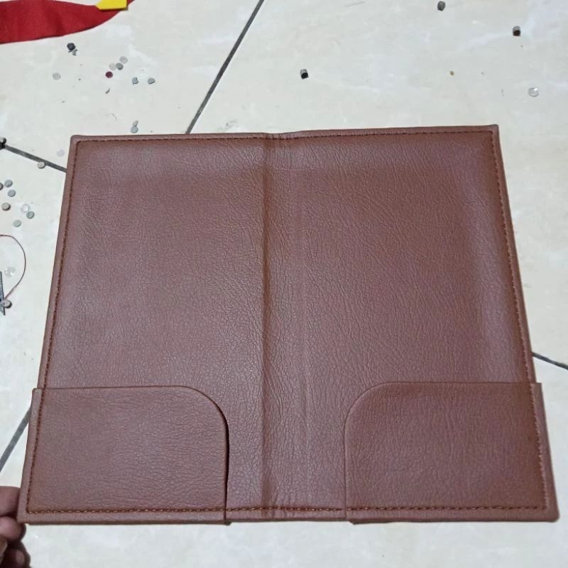 

cofer buku menu bil holder