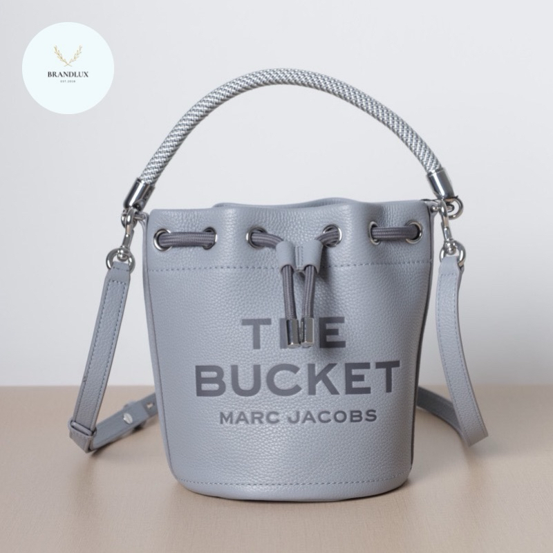 MJ Embossed Logo Bucket Bag in Wolf Grey Leather