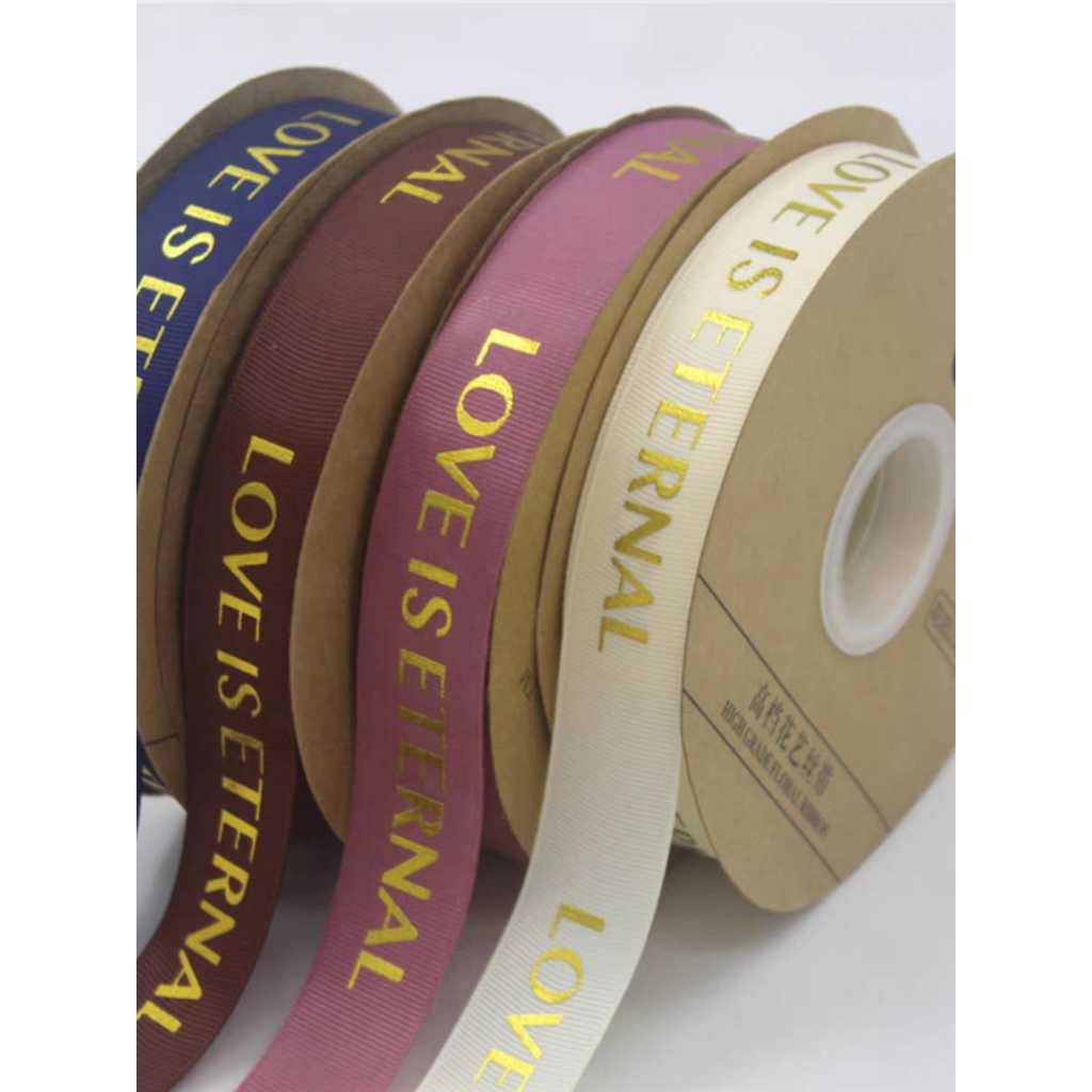 

(PER 1 ROLL) Pita Satin Tulisan Letter Love Is Eternal Ukuran 2.5cm / 1 inch