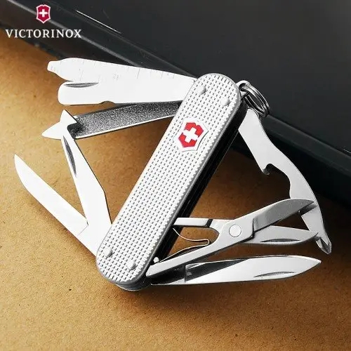 Pisau lipat pocket knife multitools victorinox mini champ alox original swiss 0.6381.26