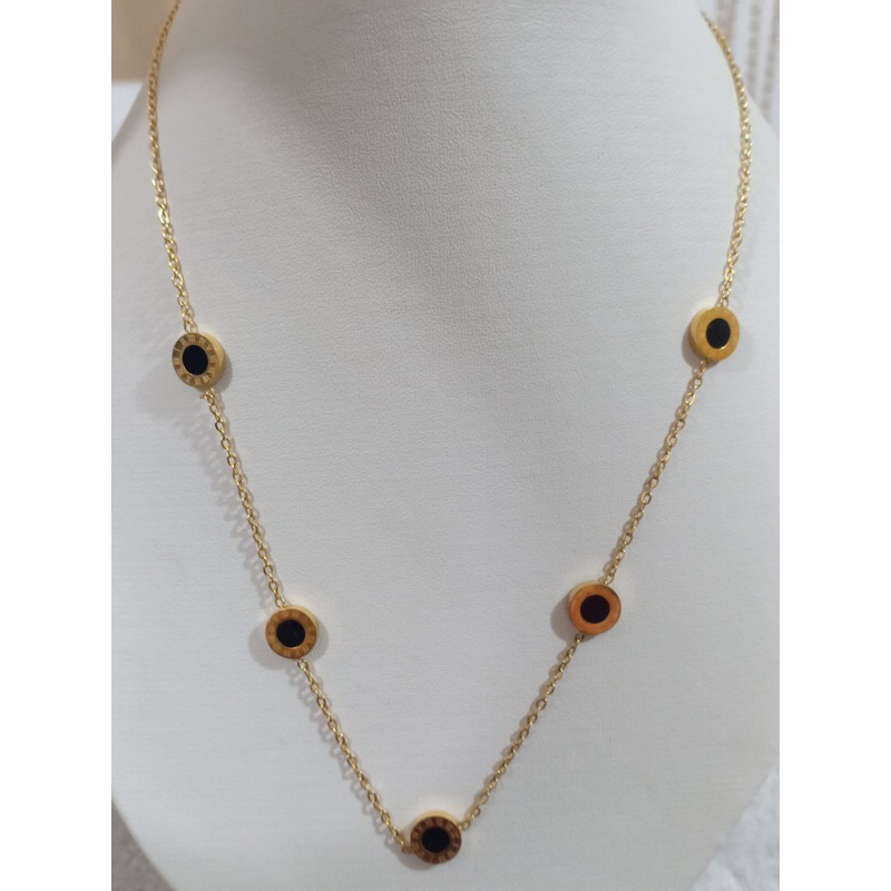 kalung titanium burbur