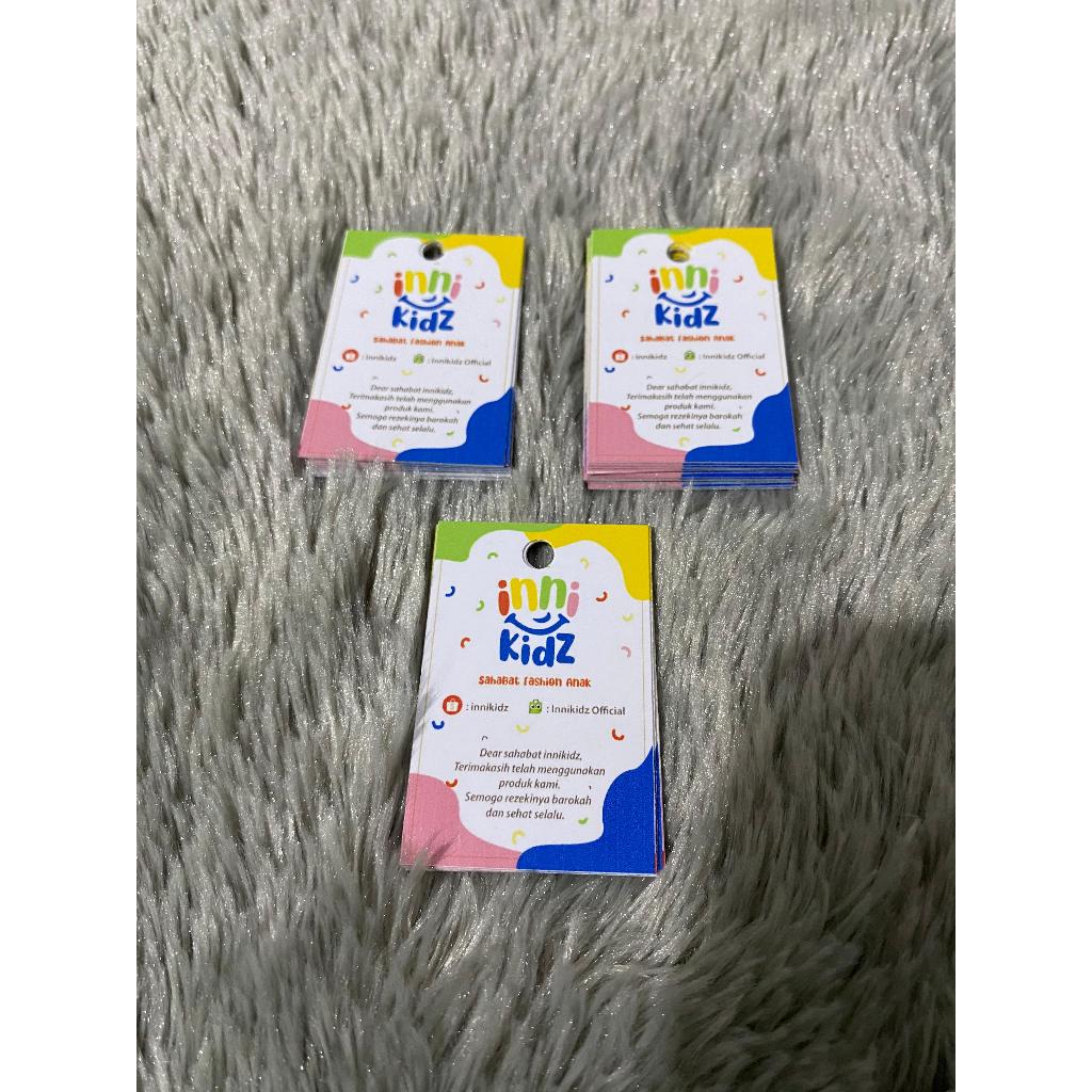 

HANGTAG | PRICE TAG | GANTUNGAN BAJU | LABEL BAJU CUSTOM DESAIN TERMURAH | Hang tag bonus tali | hantag custom | handstag toko | nemtek murah | hangtag pakaian | tag baju baru | free desain | cetak 2 sisi full colour | hangtag label kertas | ha | BISA COD