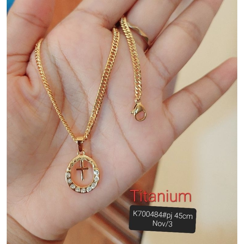 Kalung liontin titanium salib rosario