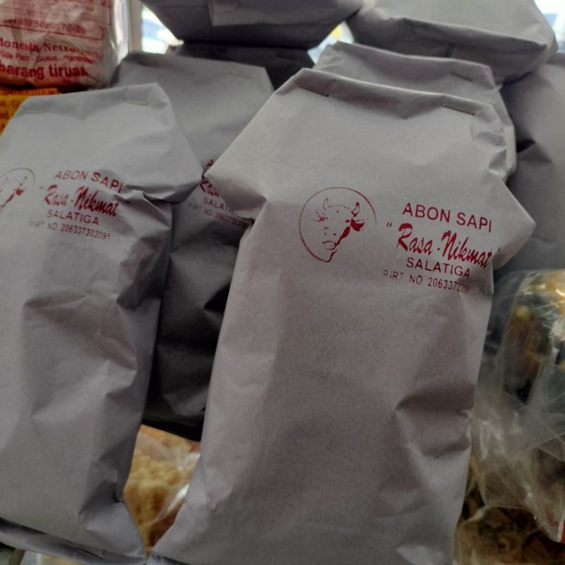 

abon sapi bungkus kertas rasa nikmat oleh oleh toko ujung