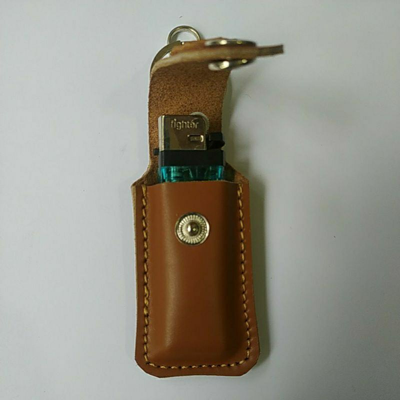 sarung macis bahan kulit