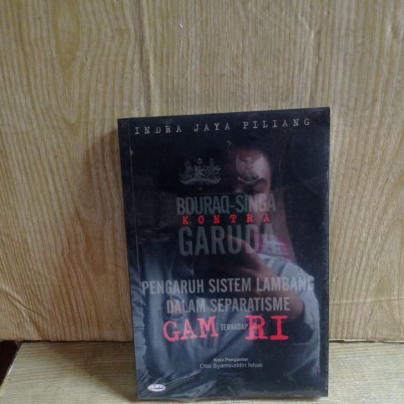 BOURAQ-SINGA KONTRA GARUDA by Indra jaya piliang