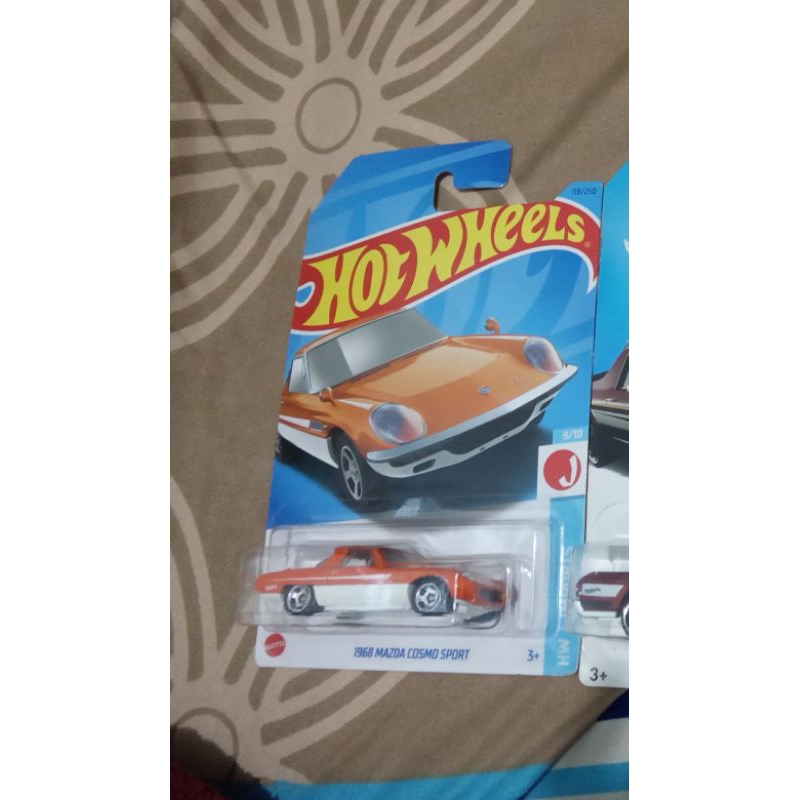 hot Wheels 1968 Mazda Cosmo sport oranye