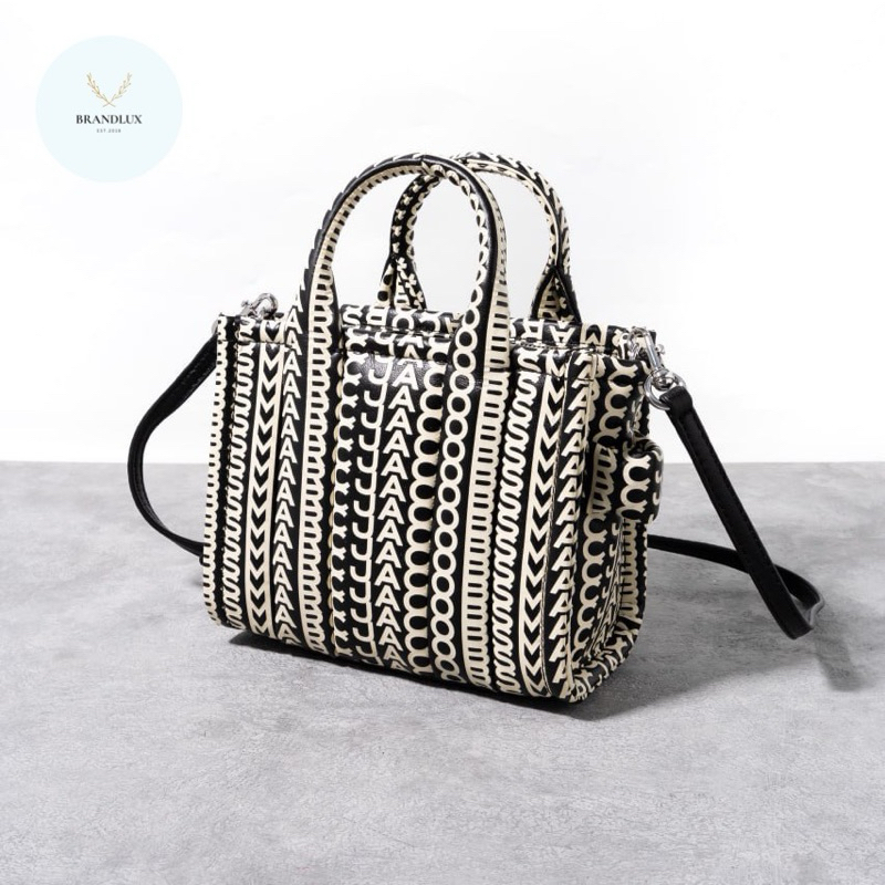 MARC JACOBS Mini traveler monogram tote bag leather