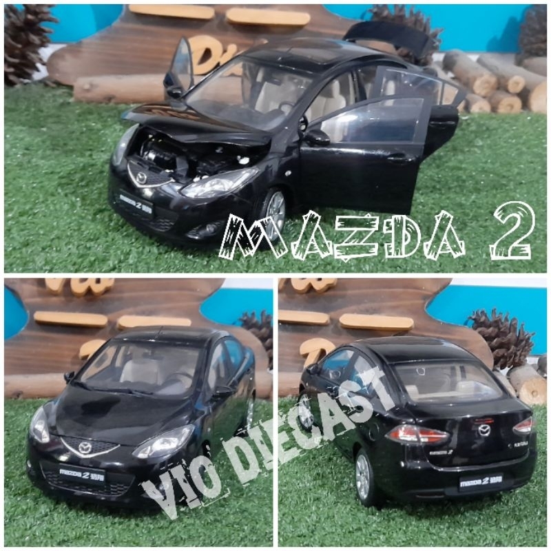 Diecast Miniatur Mazda 2 sedan skala 1:18