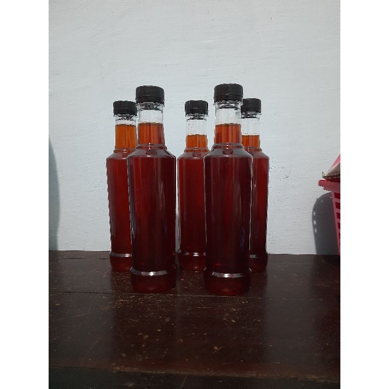 

MADU MURNI AKASIA MANGIUM 100% MADU MURNI