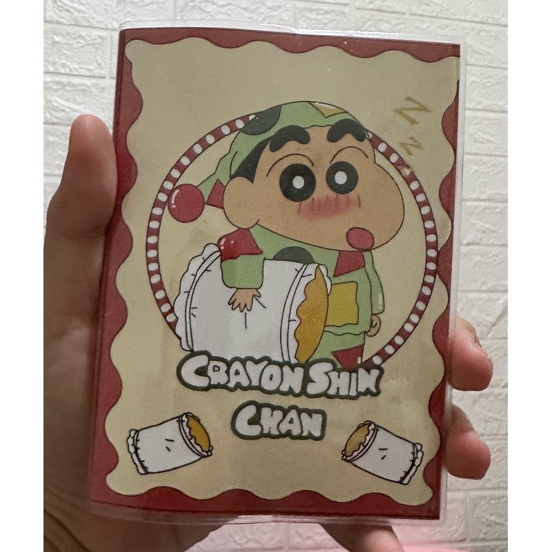 

Notebook Shinchan glitter bergaris Snoopy bergambar