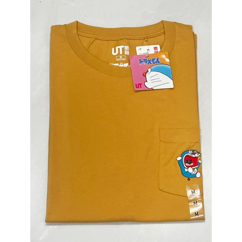 Kaos Uniqlo UT x  Doraemon Size M Kuning (BNWT) Tag Lengkap Original 100%