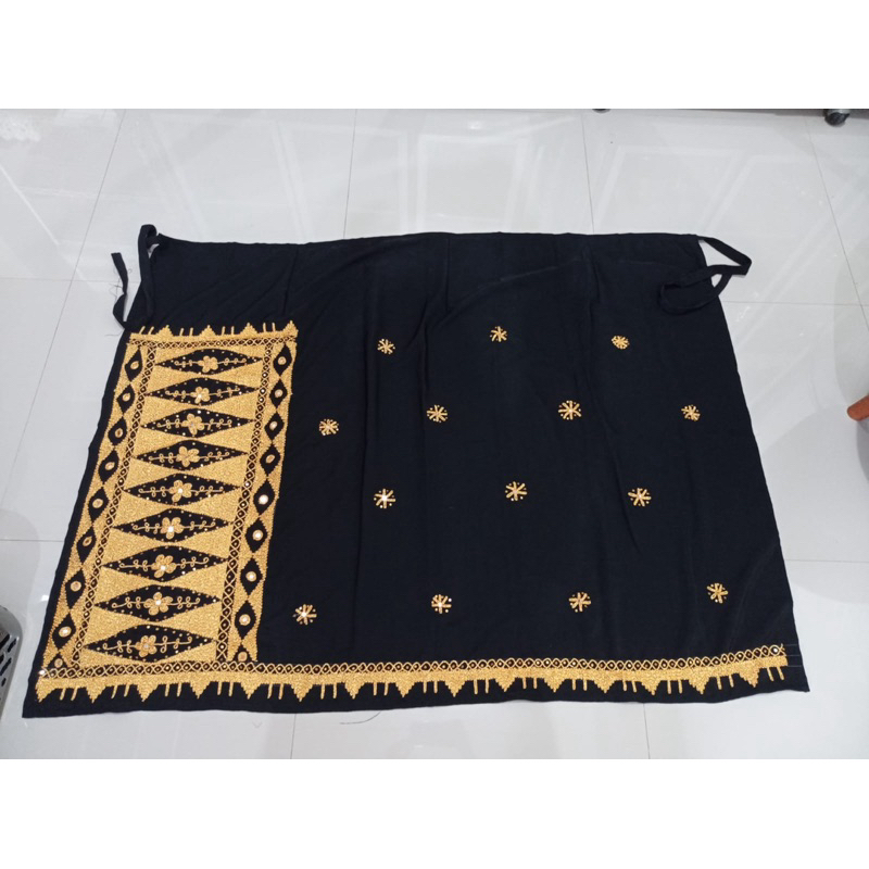 Rok lilit tapis lampung