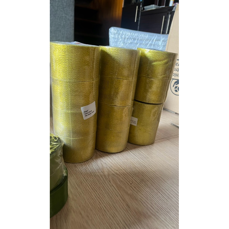 

Pita Gold Gliter 5 cm Pita Hampers Lebaran