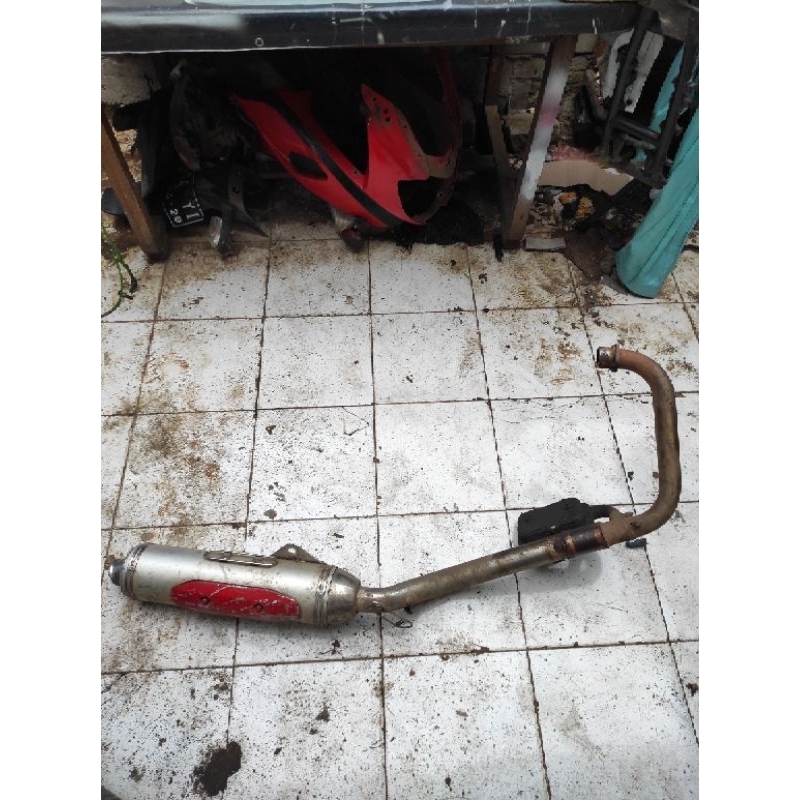 knalpot bajaj pulsar 220 original copotan