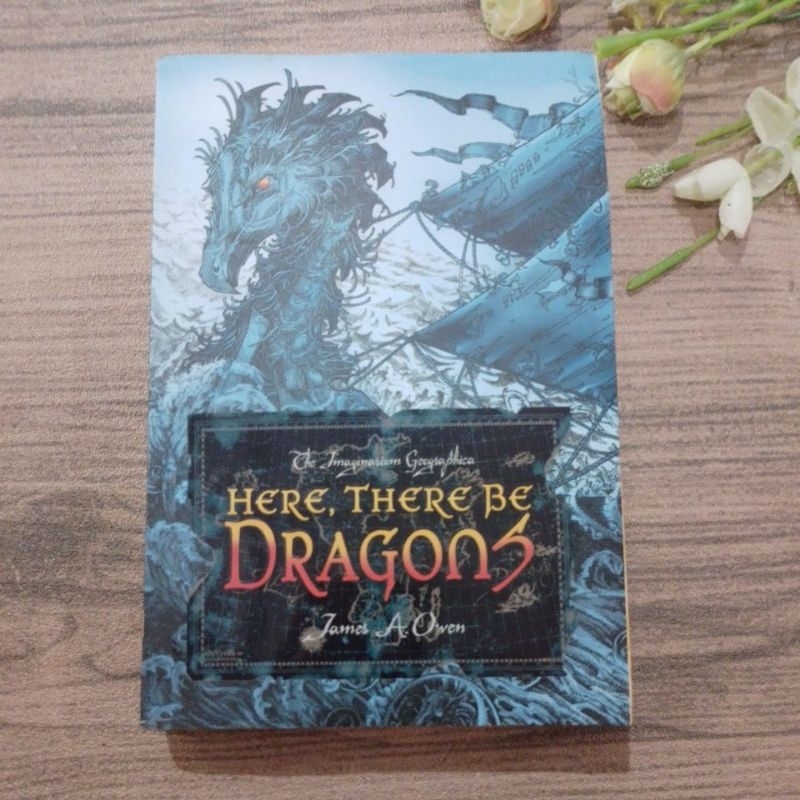 novel here there be dragon oleh james a owen preloved